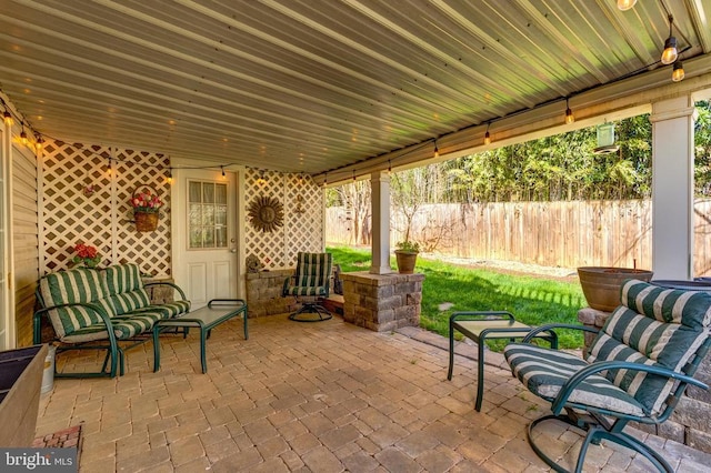 view of patio with fence