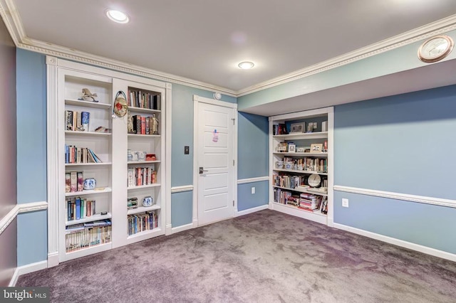 recreation room featuring crown molding, carpet flooring, built in shelves, and baseboards