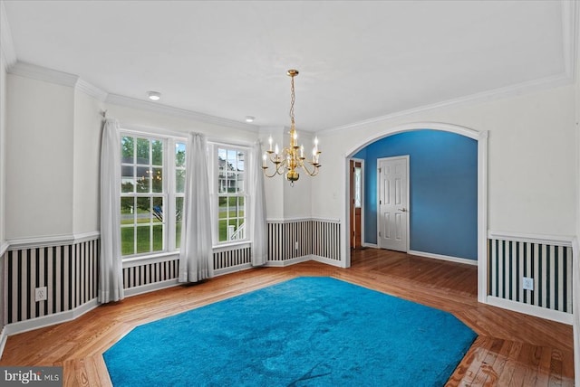 12017 Stonehenge Dr, Fredericksburg, VA 22407 - spare room featuring a chandelier, crown molding, arched walkways, and parquet flooring
