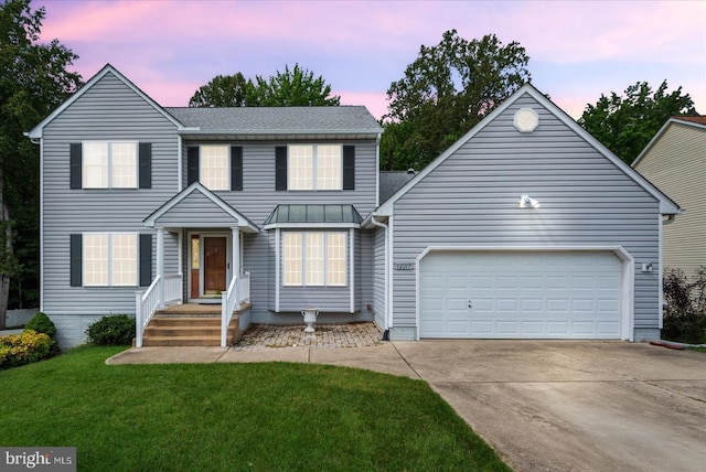 12017 Stonehenge Dr, Fredericksburg, VA 22407 - view of front of house with driveway, a lawn, a garage, and a shingled roof