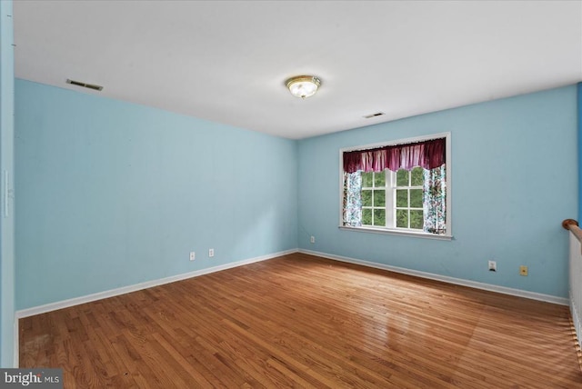 12017 Stonehenge Dr, Fredericksburg, VA 22407 - empty room with wood finished floors