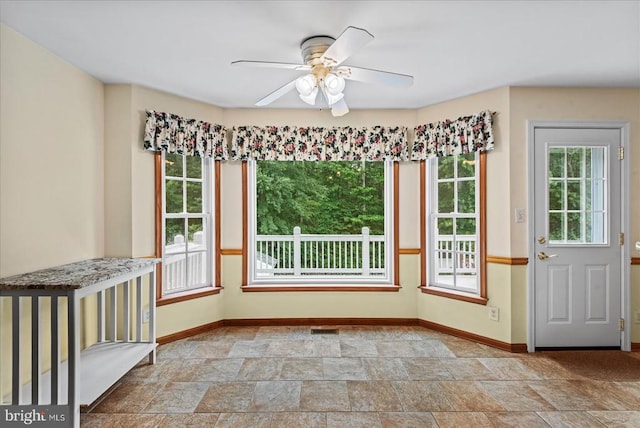 12017 Stonehenge Dr, Fredericksburg, VA 22407 - unfurnished dining area with stone finish flooring and ceiling fan