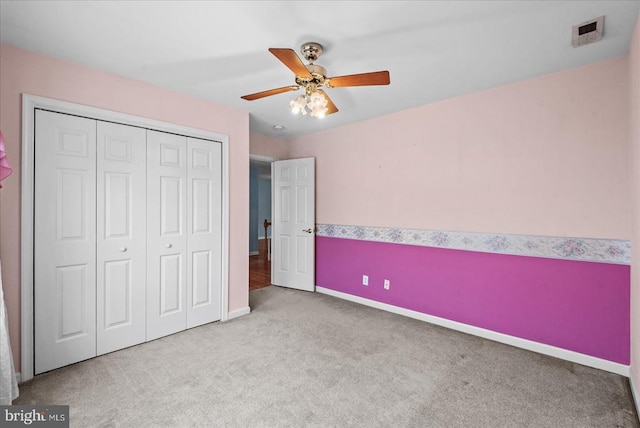 12017 Stonehenge Dr, Fredericksburg, VA 22407 - unfurnished bedroom with carpet floors, a closet, and a ceiling fan