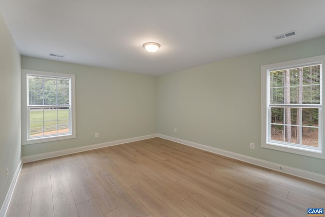 3 Lonicera Way, Charlottesville, VA 22911 - unfurnished room featuring light wood-style flooring, baseboards, and visible vents