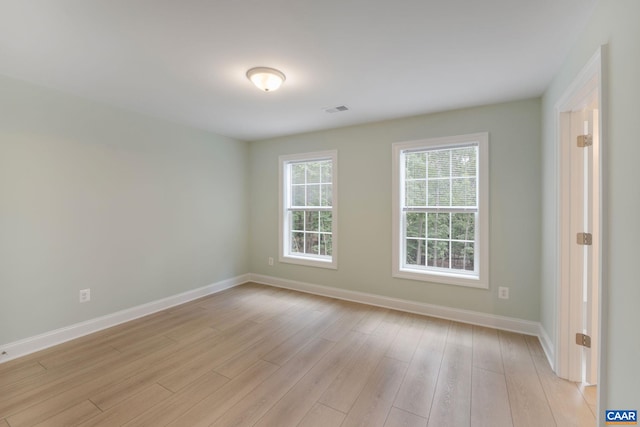 3 Lonicera Way, Charlottesville, VA 22911 - spare room featuring baseboards, light wood finished floors, and visible vents