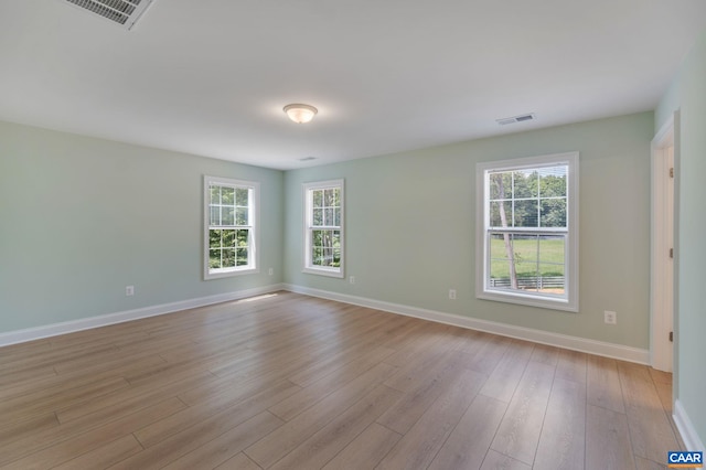 3 Lonicera Way, Charlottesville, VA 22911 - empty room featuring a healthy amount of sunlight, baseboards, and visible vents