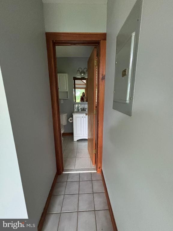 453 Lost Valley Rd, Madison, VA 22727 - corridor with electric panel, light tile patterned floors, and baseboards
