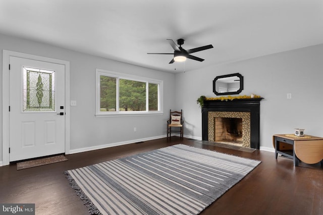 13179 Scotts Mill Rd, Culpeper, VA 22701 - living area with a ceiling fan, wood finished floors, and a tile fireplace