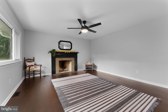 13179 Scotts Mill Rd, Culpeper, VA 22701 - living area with a fireplace, ceiling fan, wood finished floors, and baseboards