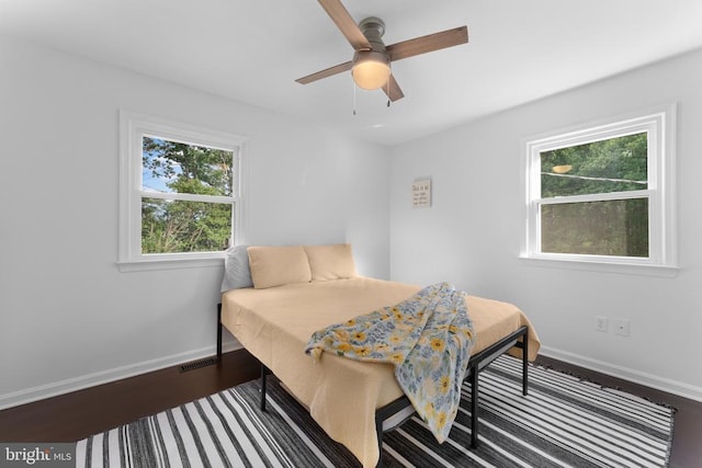 13179 Scotts Mill Rd, Culpeper, VA 22701 - bedroom with baseboards, dark wood-style floors, and a ceiling fan