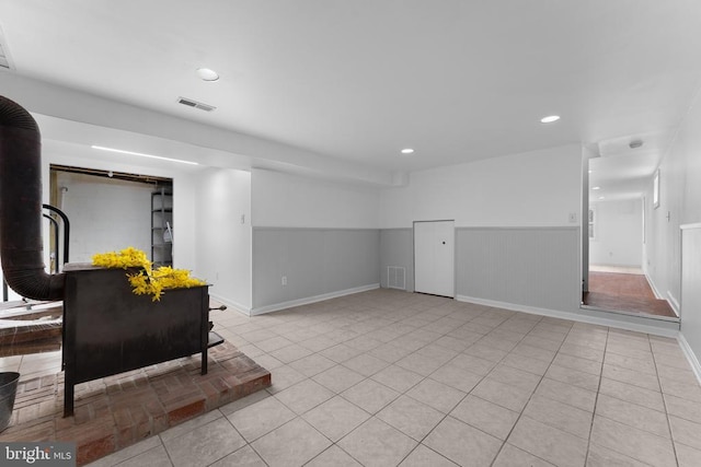 13179 Scotts Mill Rd, Culpeper, VA 22701 - empty room featuring wainscoting, recessed lighting, light tile patterned floors, and baseboards
