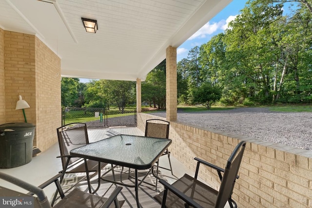 13179 Scotts Mill Rd, Culpeper, VA 22701 - view of patio featuring outdoor dining space and view of scattered trees