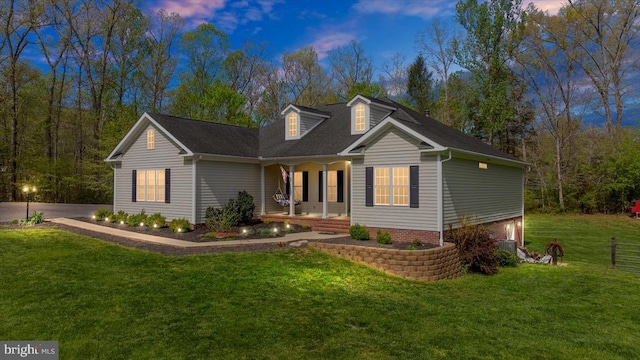 279 Carriage Ln, Madison, VA 22727 - back of house at dusk with covered porch and a lawn