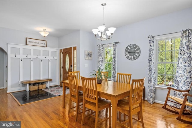 279 Carriage Ln, Madison, VA 22727 - dining room featuring wood finished floors, a chandelier, and baseboards