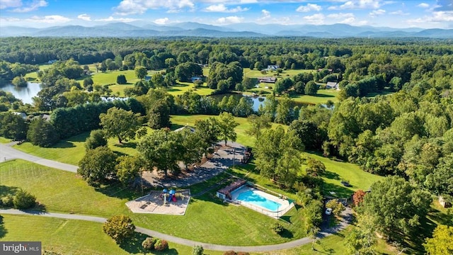 279 Carriage Ln, Madison, VA 22727 - view of property location with a forest, a pool area, and a mountain backdrop
