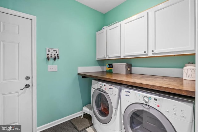 279 Carriage Ln, Madison, VA 22727 - laundry room featuring separate washer and dryer, cabinet space, and baseboards