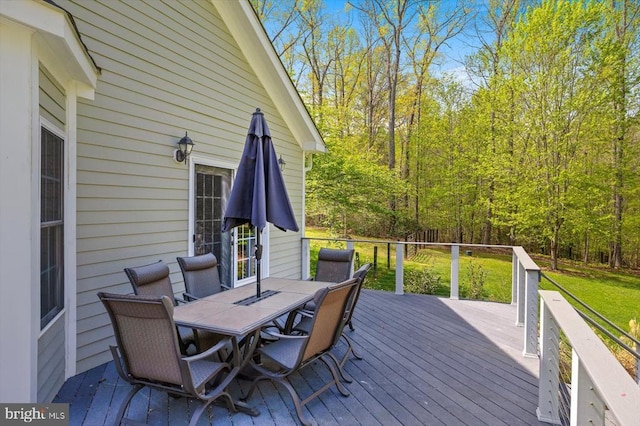 279 Carriage Ln, Madison, VA 22727 - wooden deck with outdoor dining space and a yard