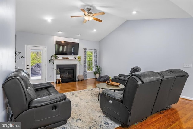 279 Carriage Ln, Madison, VA 22727 - living area with a ceiling fan, lofted ceiling, a glass covered fireplace, wood finished floors, and recessed lighting