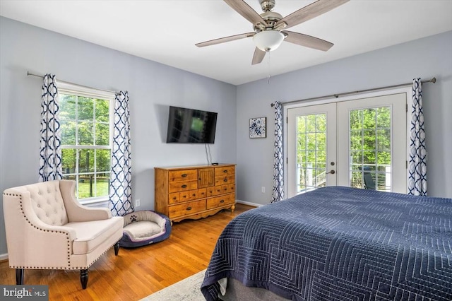 279 Carriage Ln, Madison, VA 22727 - bedroom with french doors, access to exterior, wood finished floors, a ceiling fan, and baseboards