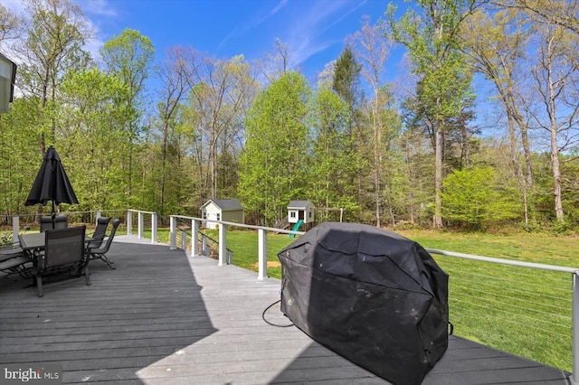 279 Carriage Ln, Madison, VA 22727 - deck featuring a storage unit, an outdoor structure, a yard, and outdoor dining space