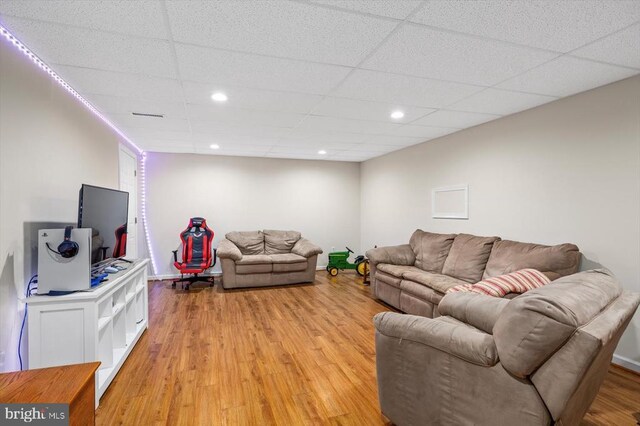 279 Carriage Ln, Madison, VA 22727 - living room featuring light wood-type flooring, recessed lighting, a paneled ceiling, and baseboards