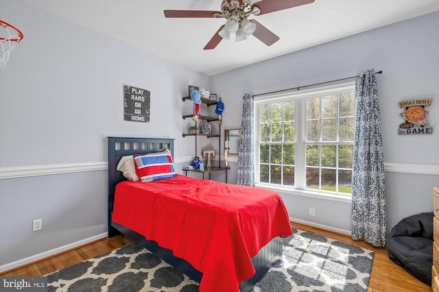 279 Carriage Ln, Madison, VA 22727 - bedroom with wood finished floors, baseboards, and ceiling fan