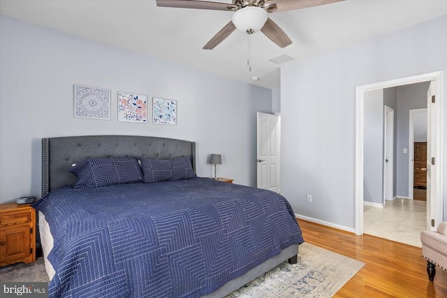 279 Carriage Ln, Madison, VA 22727 - bedroom featuring wood finished floors, a ceiling fan, and baseboards