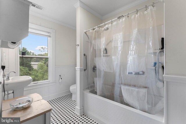 104 Fifth, Mineral, VA 23117 - full bathroom featuring plenty of natural light, wainscoting, ornamental molding, shower / bath combo, and tile patterned floors