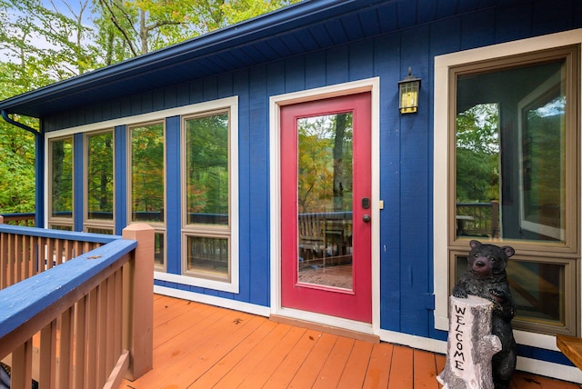 doorway to property with a wooden deck