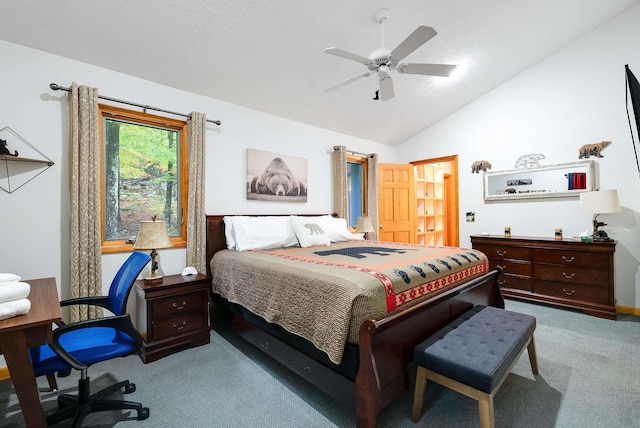 bedroom with vaulted ceiling, carpet floors, and ceiling fan