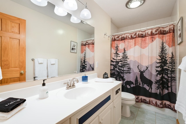 bathroom featuring vanity, tile patterned floors, toilet, and walk in shower