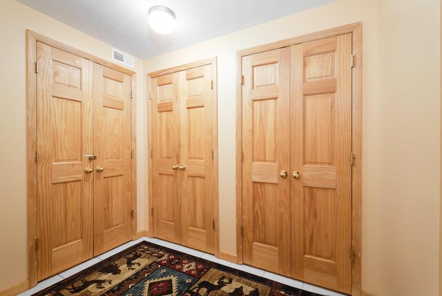 interior space with tile patterned flooring