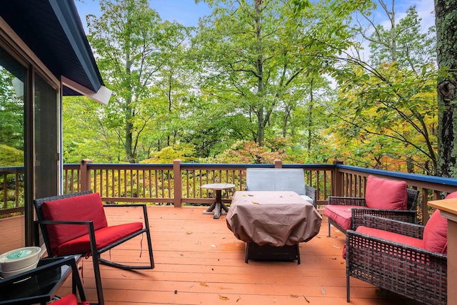 wooden deck featuring area for grilling and outdoor lounge area