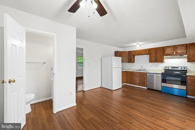 5143 Cottonwood Ct, Fredericksburg, VA 22407 - kitchen with appliances with stainless steel finishes, under cabinet range hood, dark wood-type flooring, light countertops, and ceiling fan