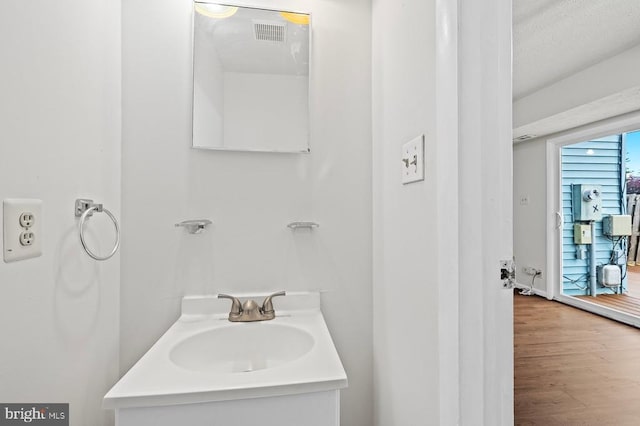 5143 Cottonwood Ct, Fredericksburg, VA 22407 - bathroom featuring wood finished floors and vanity