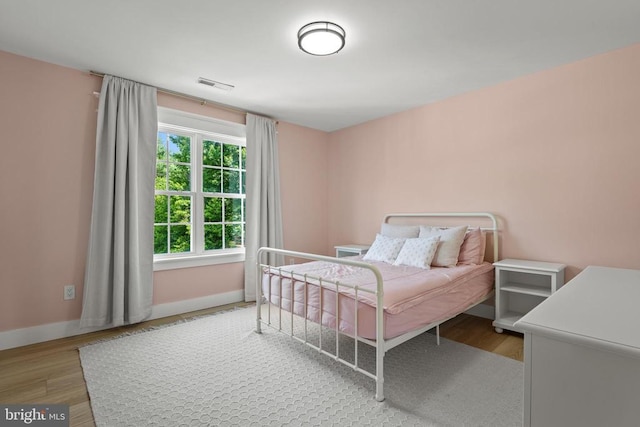 7345 Iron Bit Dr, Warrenton, VA 20186 - bedroom with wood finished floors and baseboards