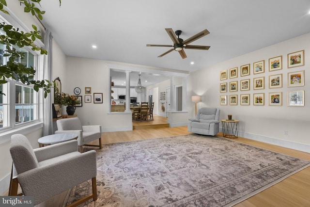 7345 Iron Bit Dr, Warrenton, VA 20186 - living area with wood finished floors, a ceiling fan, baseboards, and recessed lighting