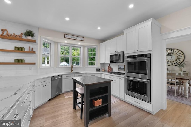 7345 Iron Bit Dr, Warrenton, VA 20186 - kitchen featuring open shelves, appliances with stainless steel finishes, a sink, backsplash, and recessed lighting