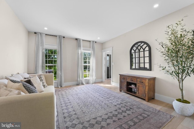 7345 Iron Bit Dr, Warrenton, VA 20186 - living room featuring light wood-style flooring, recessed lighting, and baseboards