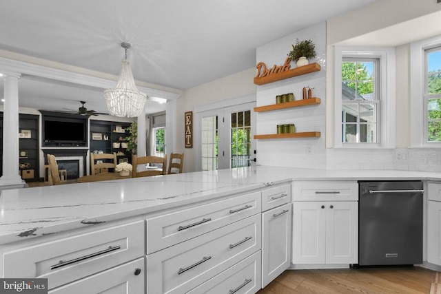 7345 Iron Bit Dr, Warrenton, VA 20186 - kitchen featuring stainless steel dishwasher, light stone counters, open shelves, a ceiling fan, and white cabinets