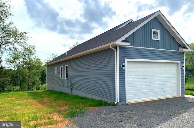 15477 Norman Rd, Culpeper, VA 22701 - view of side of home featuring a garage, driveway, board and batten siding, and roof with shingles