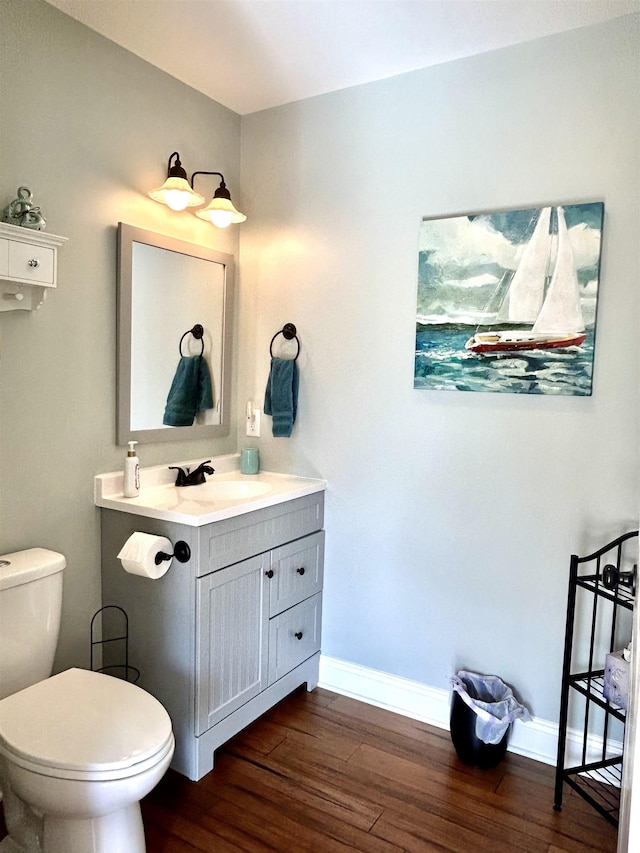 7 Rolla Mill Rd, Verona, VA 24482 - bathroom featuring wood finished floors, toilet, vanity, and baseboards