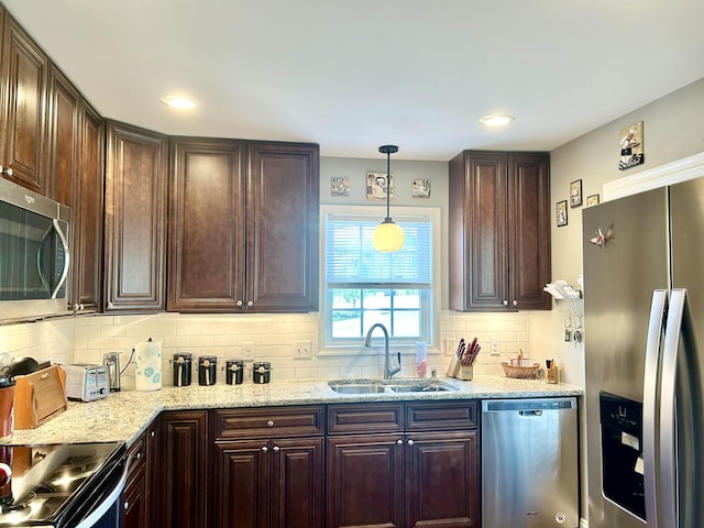 7 Rolla Mill Rd, Verona, VA 24482 - kitchen featuring stainless steel appliances, a sink, tasteful backsplash, dark brown cabinets, and recessed lighting