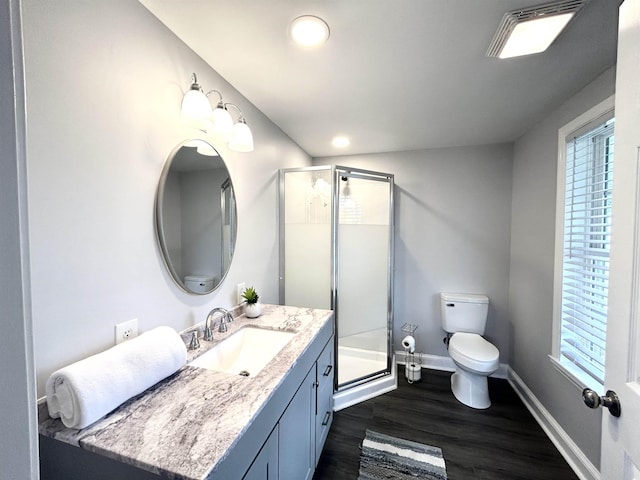 7 Rolla Mill Rd, Verona, VA 24482 - bathroom featuring toilet, a shower stall, wood finished floors, and vanity
