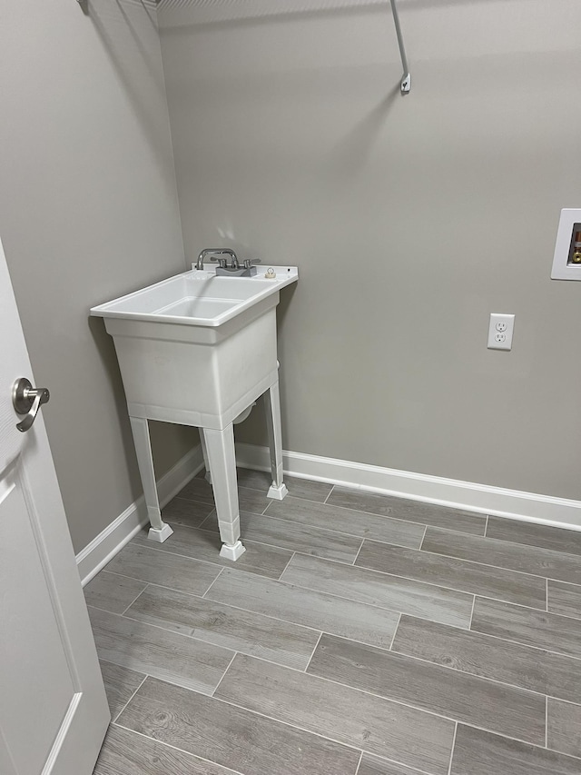 79 Meriwether Cir, Stuarts Draft, VA 24477 - laundry area featuring washer hookup, baseboards, and wood finish floors