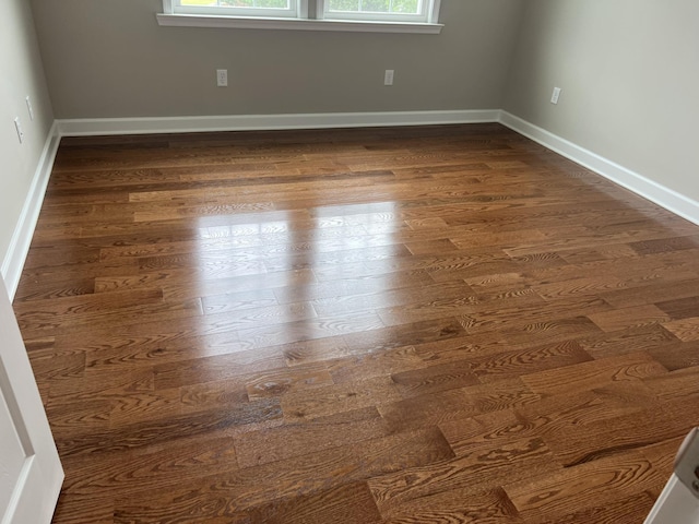 79 Meriwether Cir, Stuarts Draft, VA 24477 - empty room featuring dark wood-style flooring and baseboards