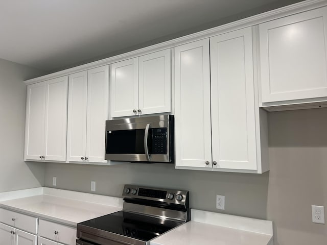 79 Meriwether Cir, Stuarts Draft, VA 24477 - kitchen featuring appliances with stainless steel finishes, light countertops, and white cabinetry