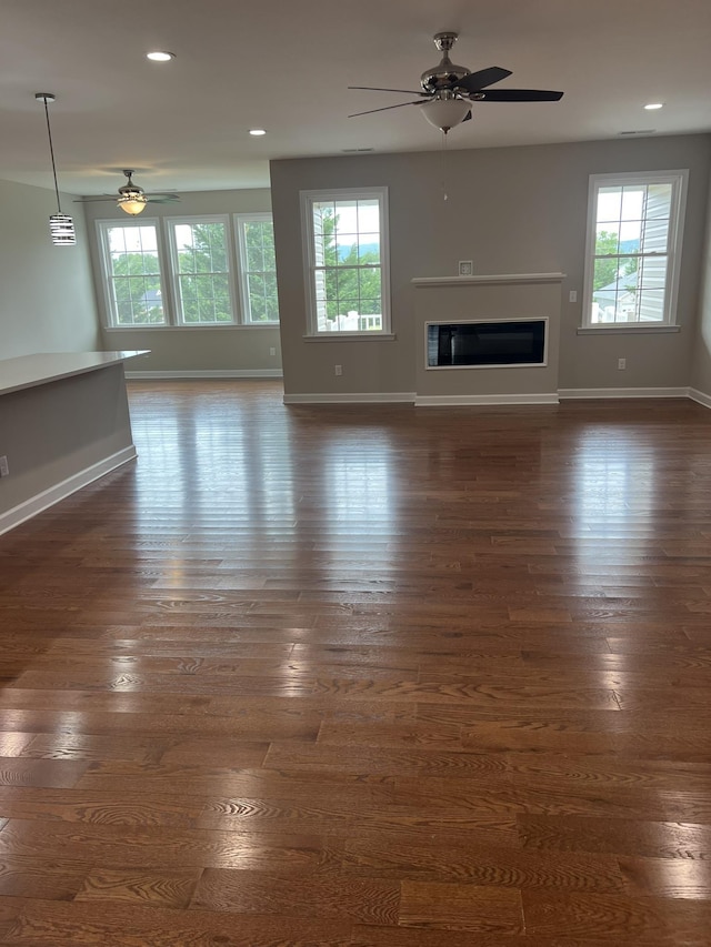 79 Meriwether Cir, Stuarts Draft, VA 24477 - unfurnished living room with a ceiling fan, healthy amount of natural light, baseboards, and recessed lighting