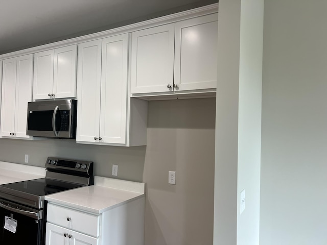 79 Meriwether Cir, Stuarts Draft, VA 24477 - kitchen with appliances with stainless steel finishes and white cabinetry