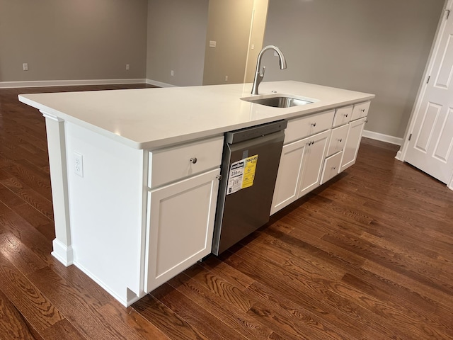 79 Meriwether Cir, Stuarts Draft, VA 24477 - kitchen with stainless steel dishwasher, a sink, dark wood-type flooring, a kitchen island with sink, and light countertops